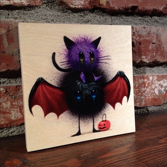 Jeff Soto's Candy Eater print on wood